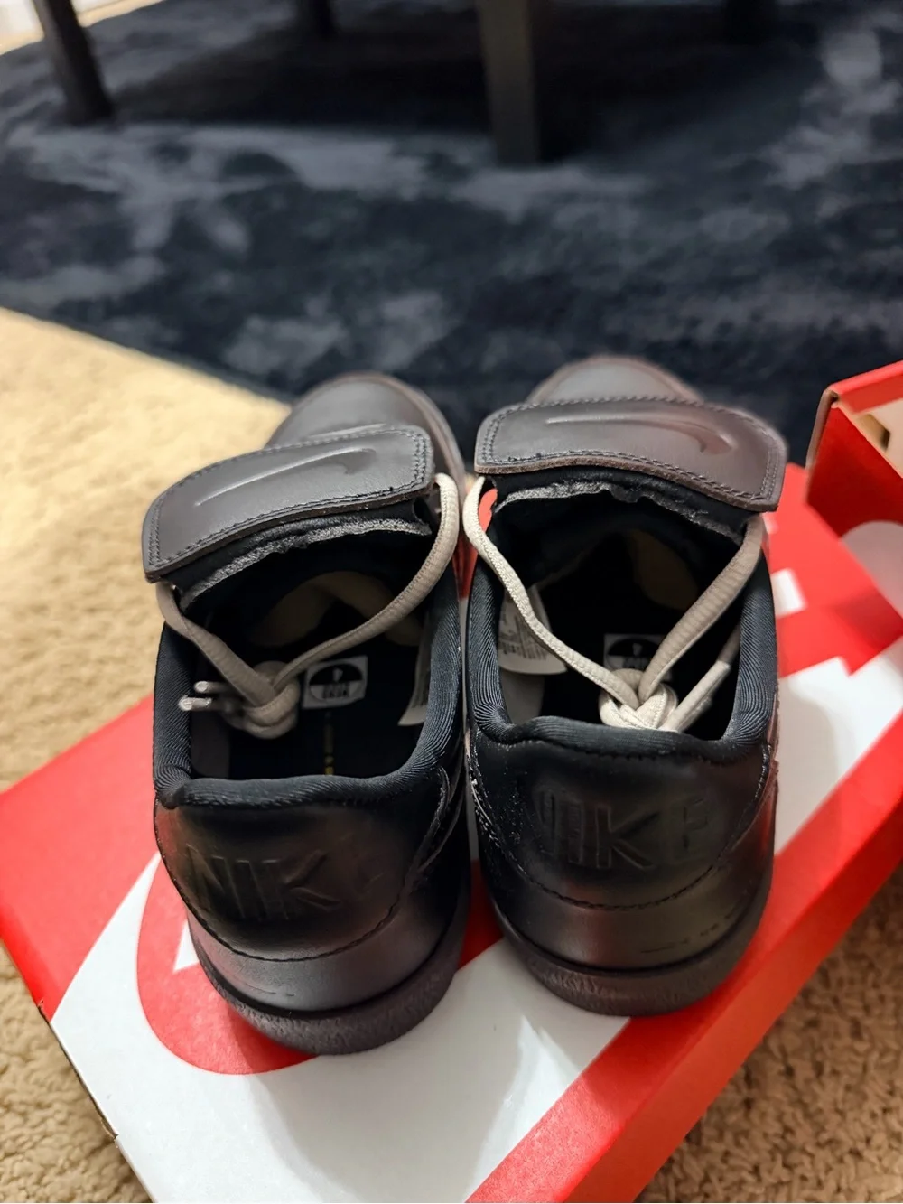 Nike Black Leather Men's Sneakers with Cream Laces and Strap Accent